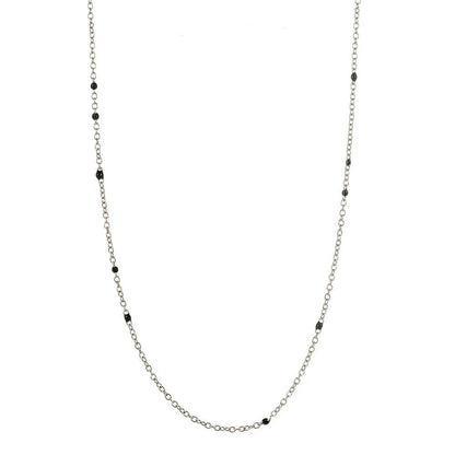 Silver link necklace with small black bead accents along the chain