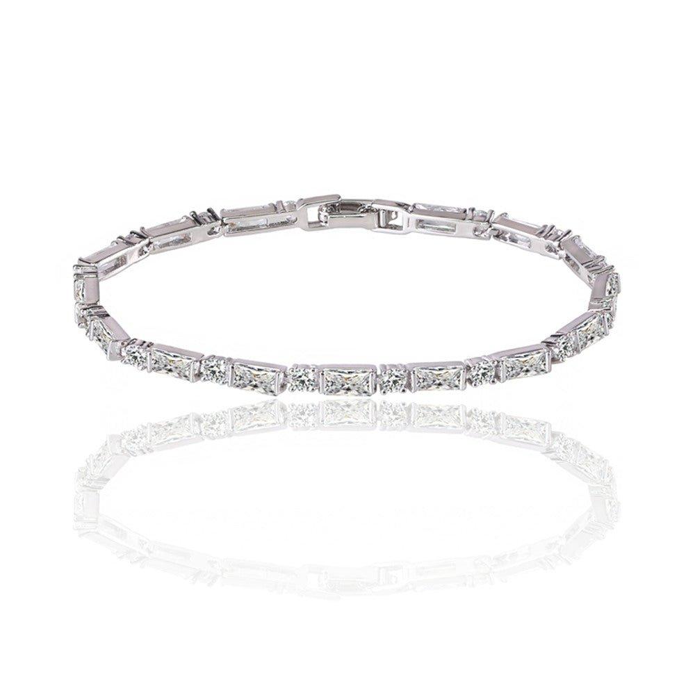 Cubic zirconia tennis bracelet with straight bar settings and clear stones, silver-tone