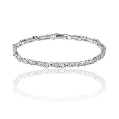 Cubic zirconia tennis bracelet with straight bar settings and clear stones, silver-tone