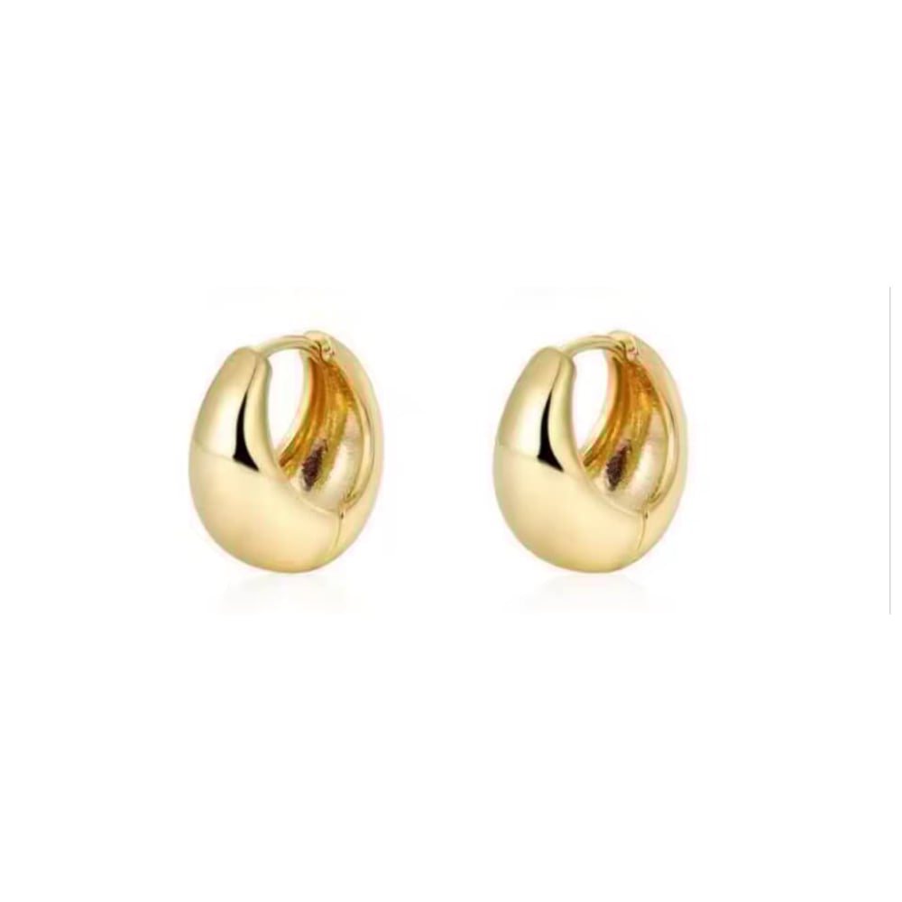 Gold huggie hoop earrings with smooth polished finish, shown as a pair