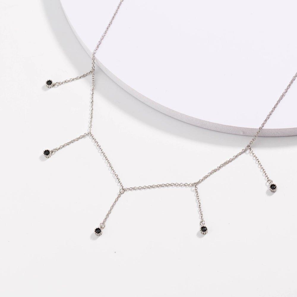 Silver chain drop necklace with five black CZ dangle points