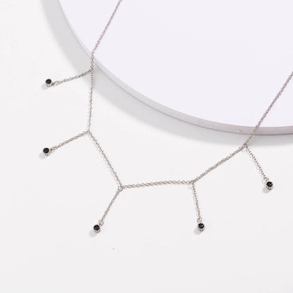 Silver chain drop necklace with five black CZ dangle points