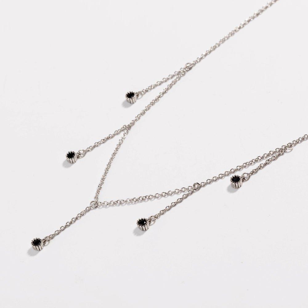 Silver drop necklace with five black CZ dangle stones on linked chain
