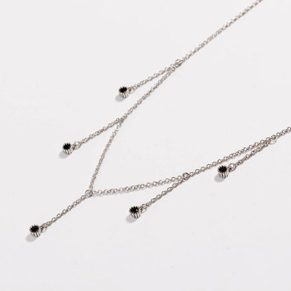 Silver drop necklace with five black CZ dangle stones on linked chain