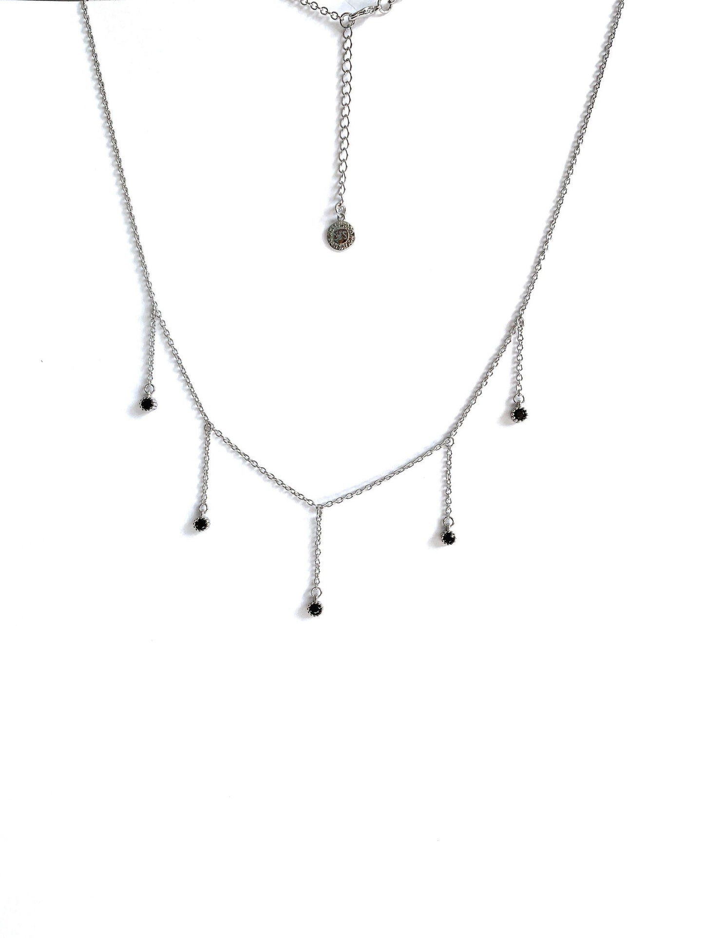 Dainty silver drop necklace with five dark cubic zirconia dangle stones