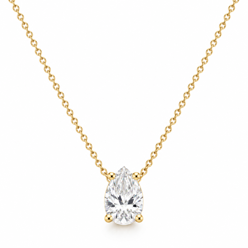 Gold pear-shaped solitaire pendant necklace with clear round stones and cable chain