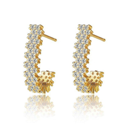 Gold J hoop earrings with sparkling cubic zirconia row and small dangling cluster