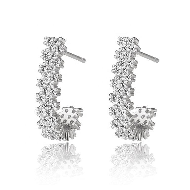 Silver J hoop earrings with sparkling cubic zirconia row and small dangling cluster