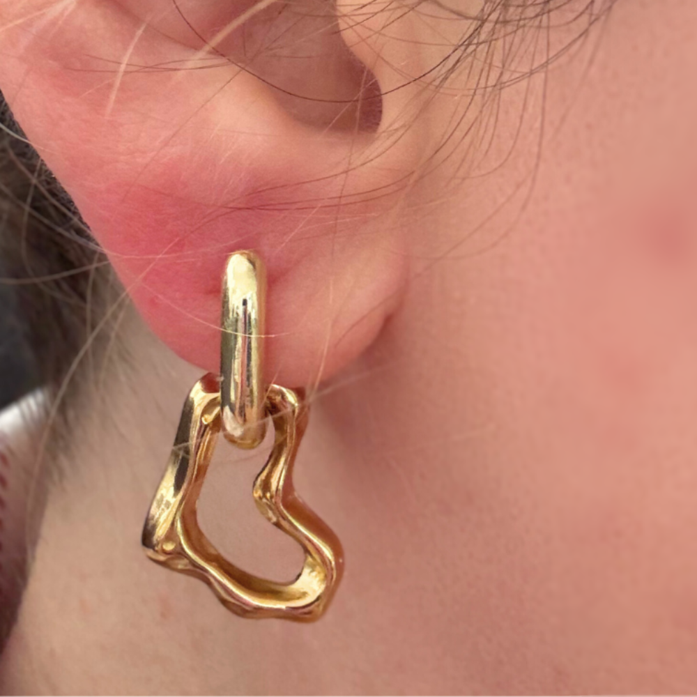 Gold link drop earrings featuring a curved openwork charm and smooth top loop.