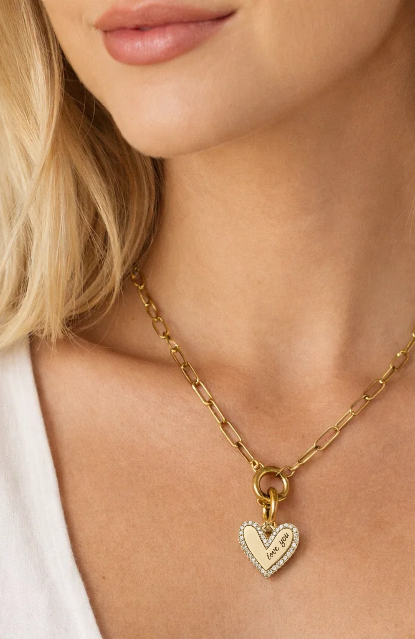 Elena gold heart pendant necklace with pavé edge and Love You charm