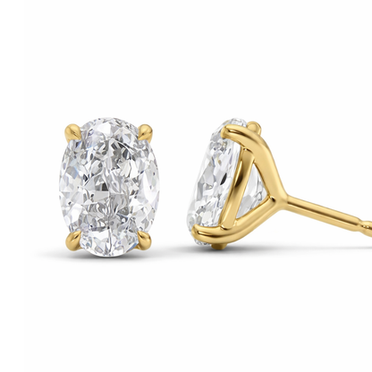Gold vermeil oval-cut moissanite stud earrings with secure bezel settings