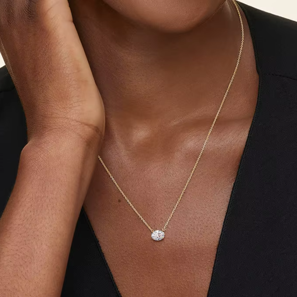Gold vermeil oval-cut solitaire moissanite necklace with small pendant on chain