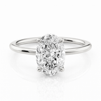 Silver-tone oval cut solitaire ring with four-prong setting and polished band