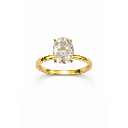 Gold oval-cut solitaire ring with four-prong setting