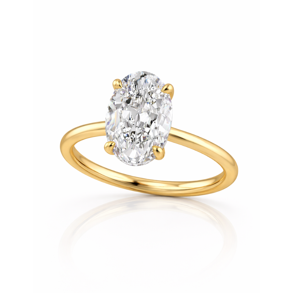 Gold oval-cut solitaire ring with four-prong setting, angled view