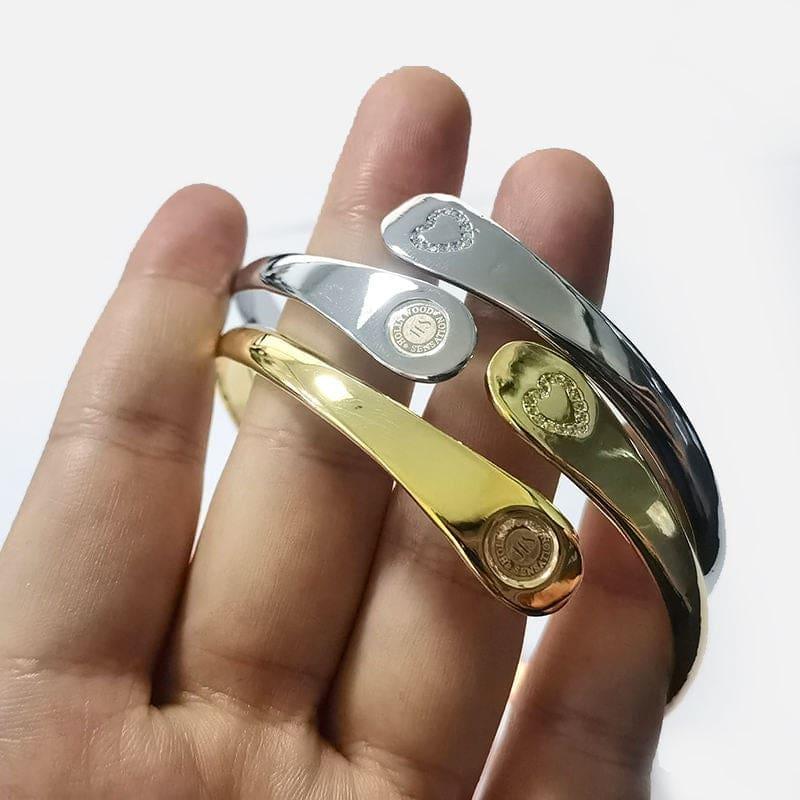 Gold and silver mother-daughter engraved bracelets with circular charm accents