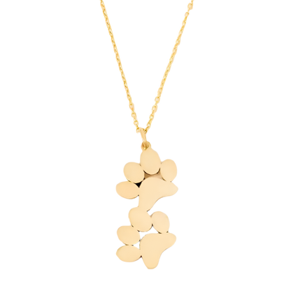 Gold-tone double paw print pendant necklace, isolated pendant detail