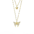 Two-layer butterfly necklace set with gold-tone chains and dangling butterfly pendants