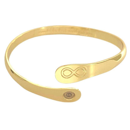 Gold infinity friendship bracelet with engraved infinity symbol and small round logo tag.