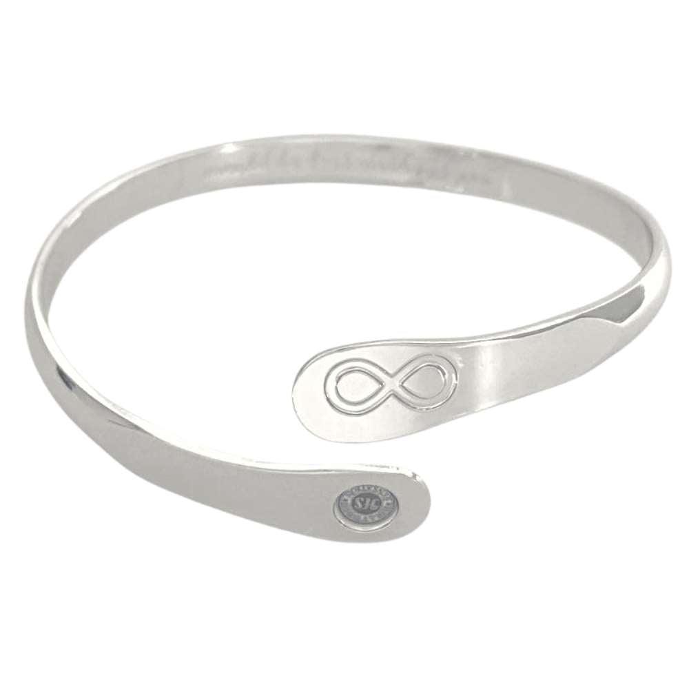 Silver infinity friendship bracelet with engraved infinity symbol and small round logo tag.