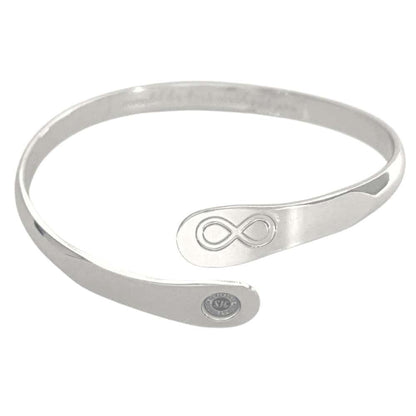 Silver infinity friendship bracelet with engraved infinity symbol and small round logo tag.