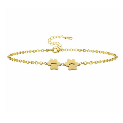 Gold double paw print charm bracelet with lobster clasp