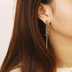 Gold-tone chain drop dangle earrings with round links and a long straight bar