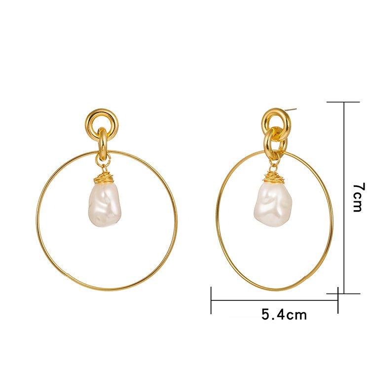 Gold-tone drop hoop earrings with simulated pearl teardrop charms, shown as a pair