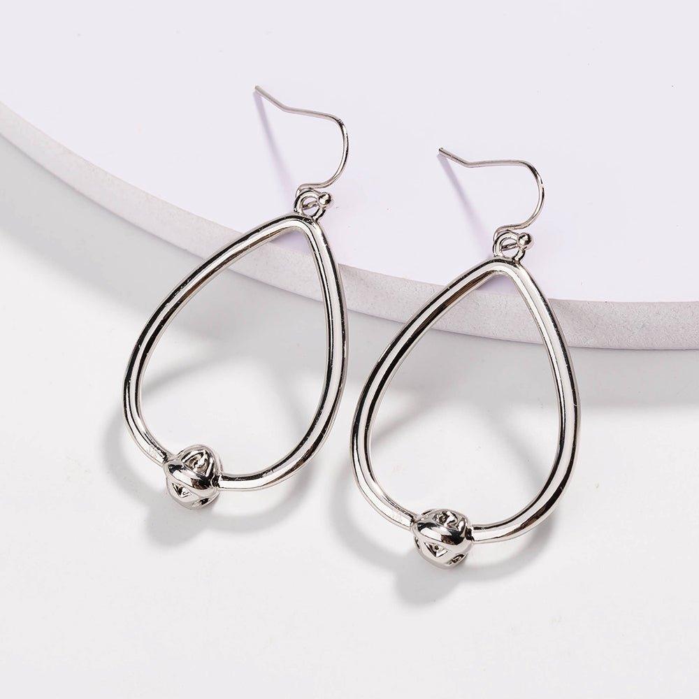 Silver teardrop hoop earrings with love-knot charm and hook backs