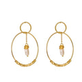 Gold double hoop earrings with small pearl drop charms and textured hoop details.