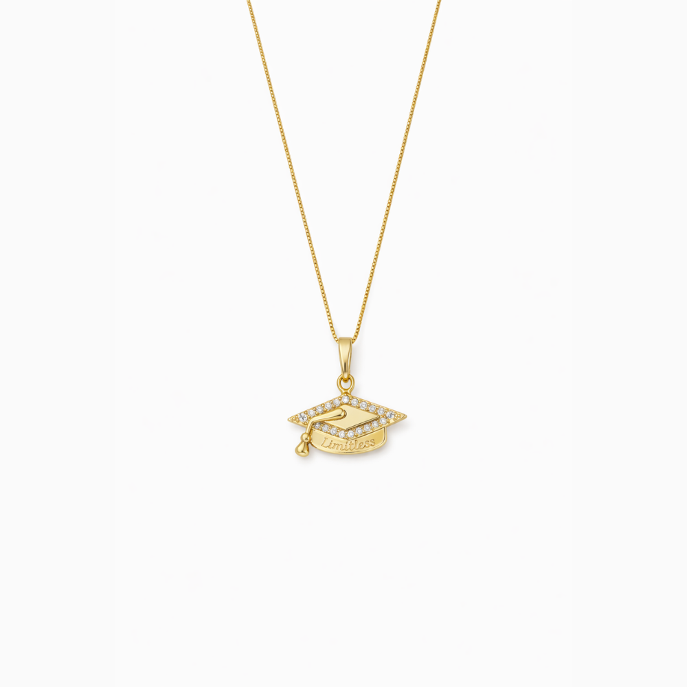 Gold graduation cap pendant necklace with “Limitless” text and crystal detail