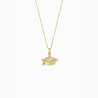Gold graduation cap pendant necklace with “Limitless” text and crystal detail
