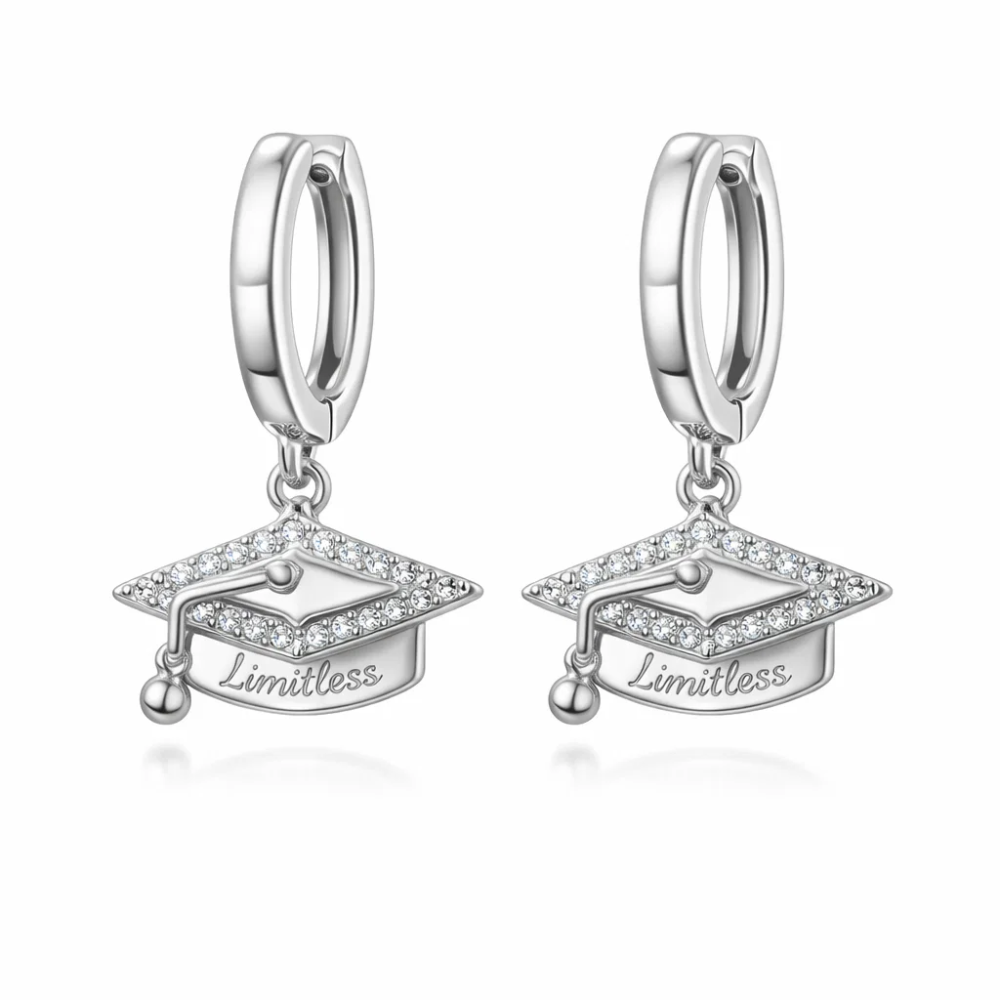 Silver huggie hoop earrings with graduation cap charm and small tassel, “Limitless”