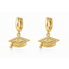 Gold huggie hoop earrings with graduation cap charm and “Limitless” text