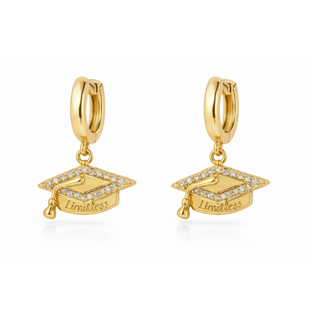 Gold huggie hoop earrings with graduation cap charm and “Limitless” text