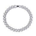 White CZ tennis bracelet with linked heart and marquise stones, silver clasp