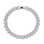 White CZ tennis bracelet with linked heart and marquise stones, silver clasp