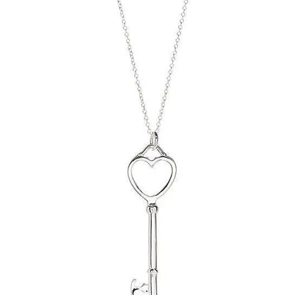 Heart locket and key pendant necklace, silver-tone chain and charm