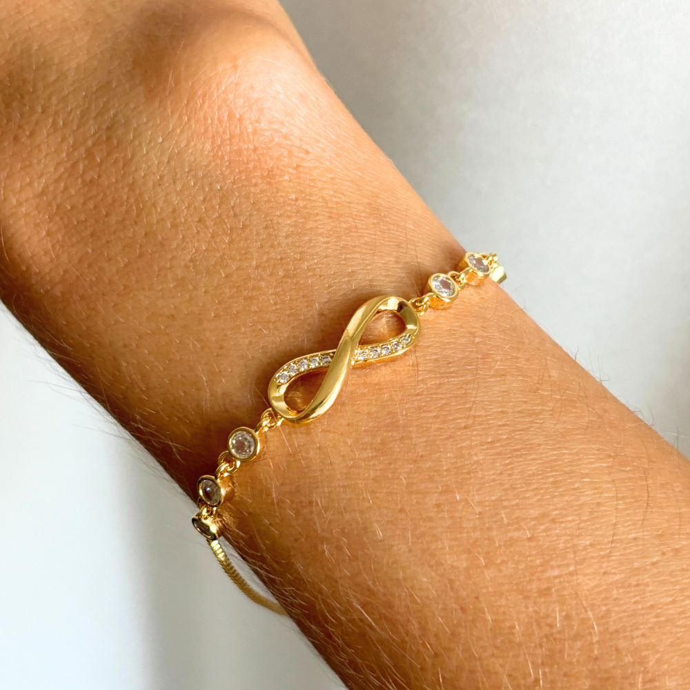 Gold infinity bracelet with crystal accents