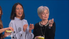 Infinity bracelet not clearly visible; jewelry on clothing in scene