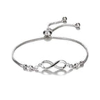Silver infinity bracelet with adjustable chain and small crystal accents