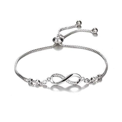 Silver infinity bracelet with adjustable chain and small crystal accents
