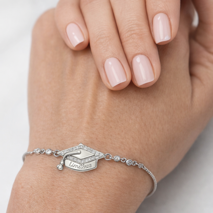 Silver adjustable bracelet with graduation cap pavé charm