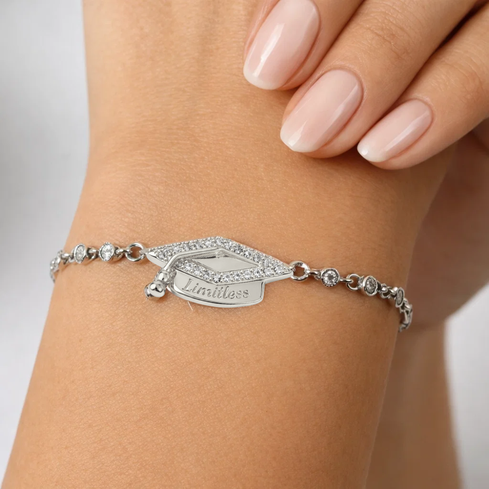 Silver adjustable bracelet with pavé graduation cap charm and engraved tag
