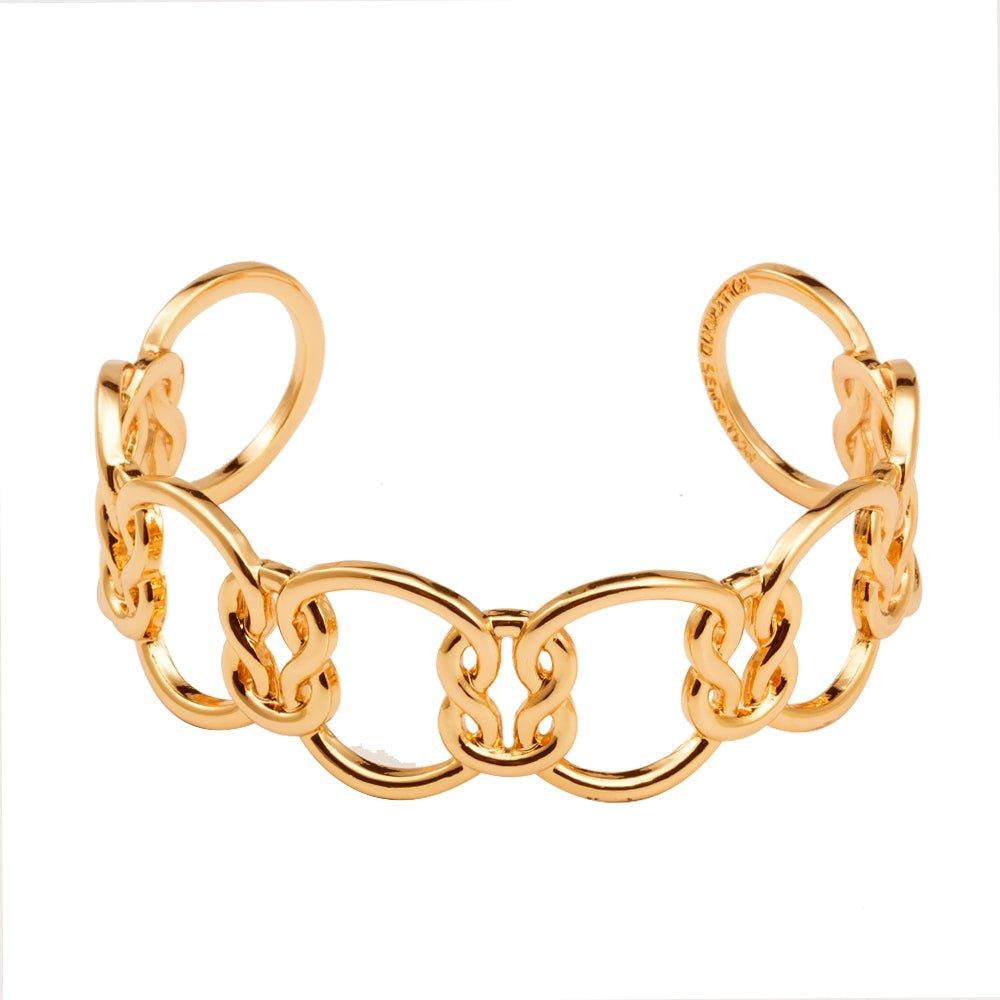 Gold love-knot link bracelet with alternating oval loops and raised knot charms
