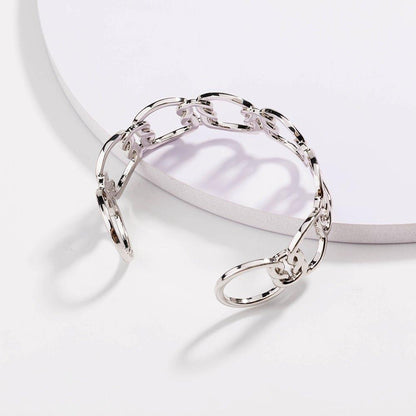 Silver love-knot link bracelet, close view of circular chain links and knot detail
