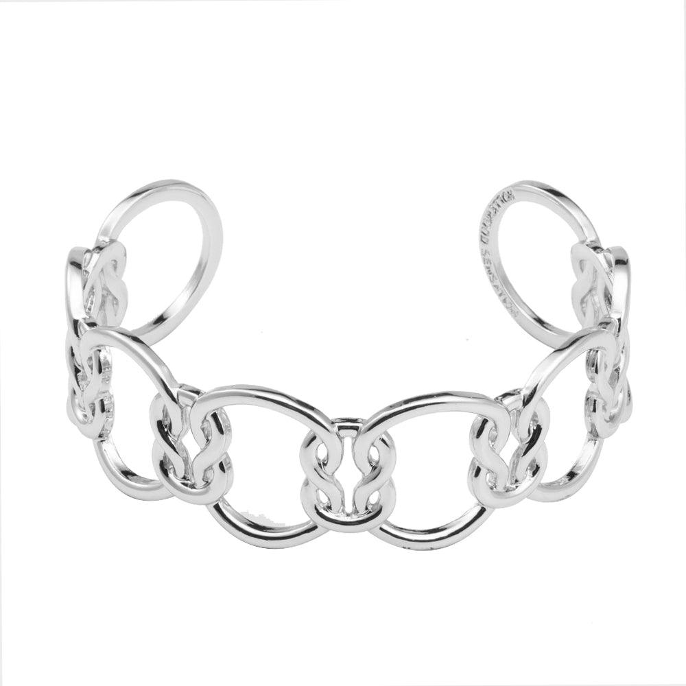 Silver love-knot link bracelet with alternating oval loops and raised knot charms