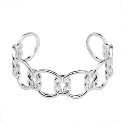 Silver love-knot link bracelet with alternating oval loops and raised knot charms