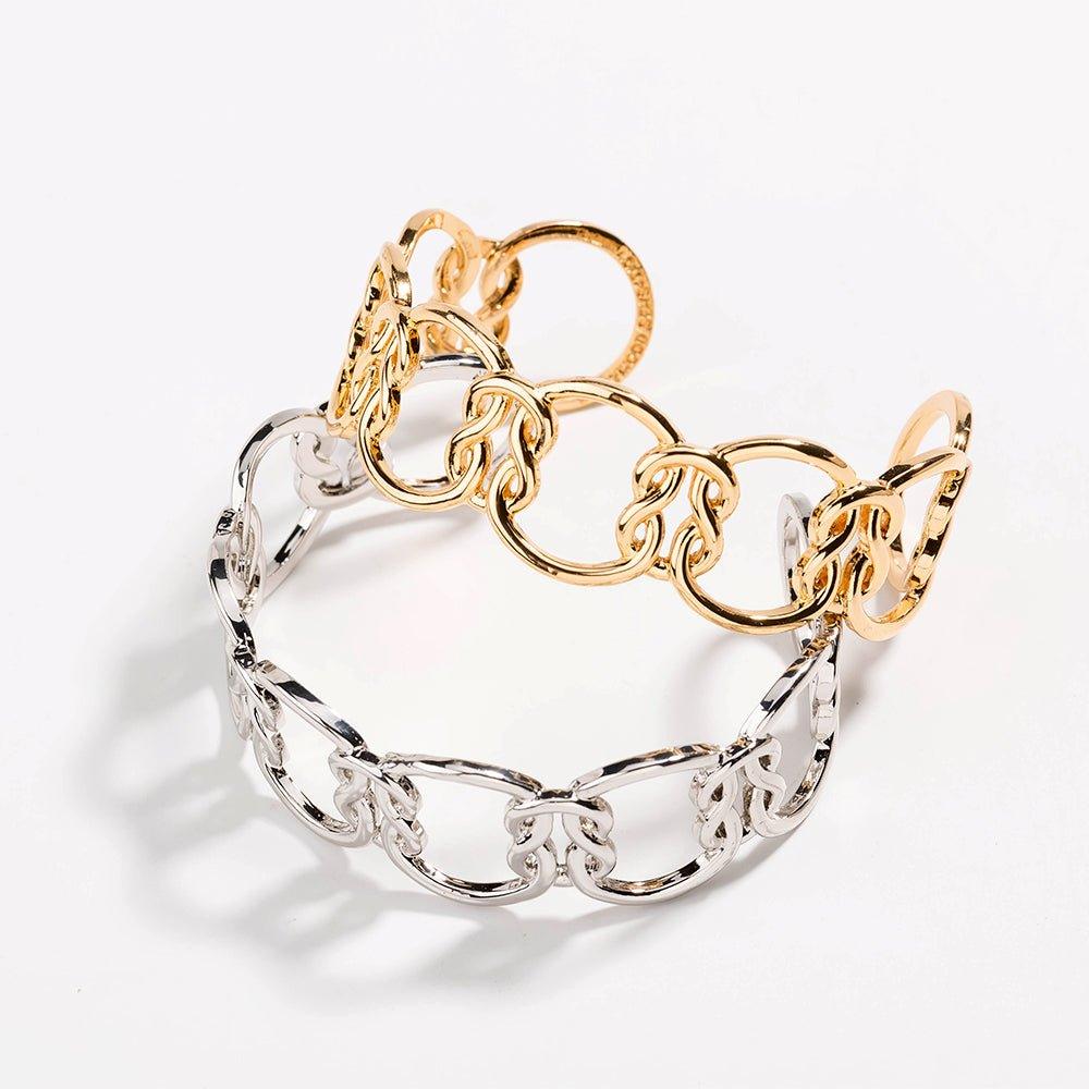 Two-tone bracelet with gold and silver knot links and oval chain loops