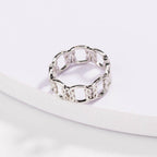 Silver love-knot chain ring with interlocking sculpted link band